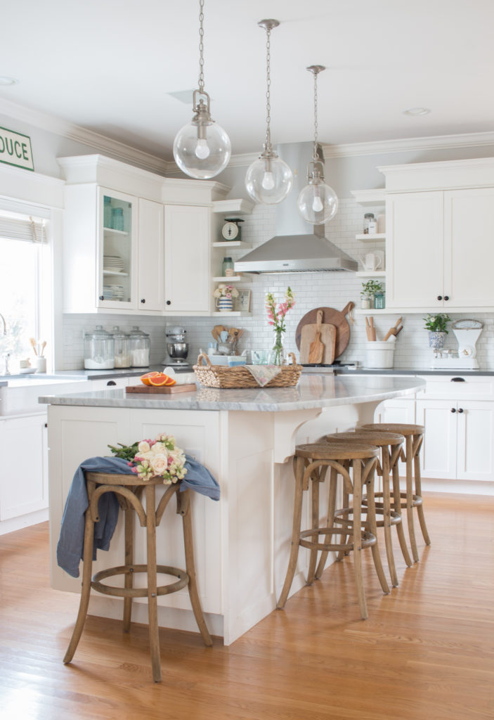 Saw Nail Paint Seattle Home Tour - Cottage Farmhouse White Kitchen Island Warm Wood Bar Stools Clear Glass Pendants 