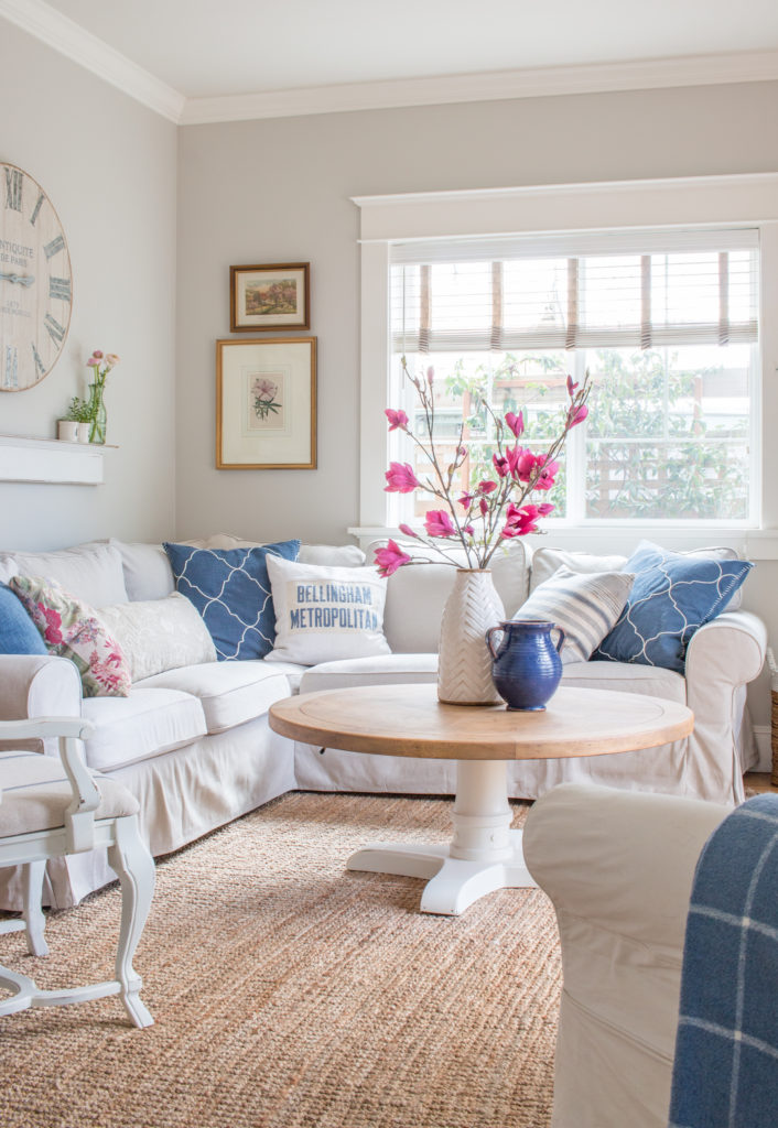 Saw Nail Paint Seattle Cottage Home Tour - Charming Living Room, Sectional Sofa, White Wood Coffee Table, Blue and Pink Accents